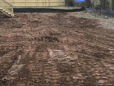 Property regrading for proper drainage